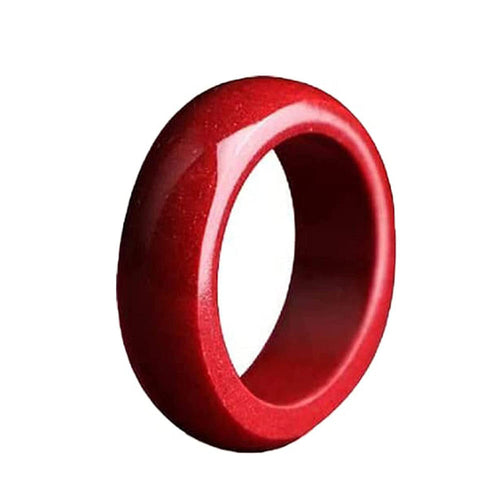 Cinnabar ring on finger lifestyle scene